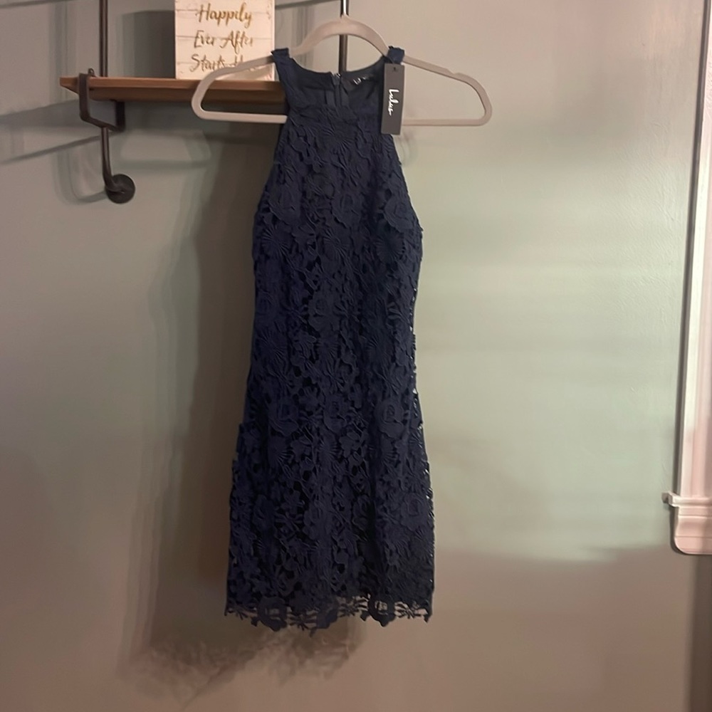 Never been worn with the tags! Love Poem Navy Blue Lace Mini
Dress